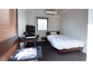 Llit o llits en una habitació de 8HOTEL CHIGASAKI - Vacation STAY 87511v
