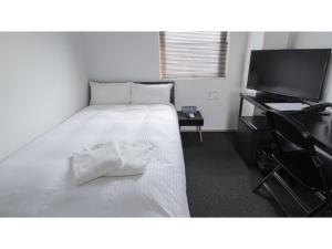 Llit o llits en una habitació de 8HOTEL CHIGASAKI - Vacation STAY 87511v