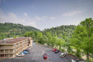 an aerial view of a parking lot in front of a hotel at Stylish Gatlinburg Condo with Pool Walk Downtown! in Gatlinburg