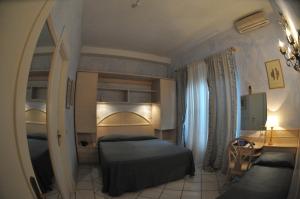 Postel nebo postele na pokoji v ubytování Hotel Atlantic