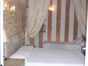 Postel nebo postele na pokoji v ubytování Hotel Atlantic