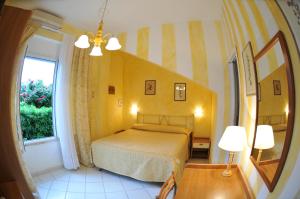 Postel nebo postele na pokoji v ubytování Hotel Atlantic