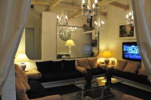 TV a/nebo společenská místnost v ubytování Hotel Atlantic
