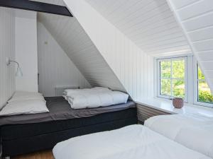 Postel nebo postele na pokoji v ubytování Holiday home Auning