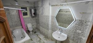 A bathroom at Alex sea view apartment - families only