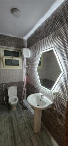 A bathroom at Alex sea view apartment - families only