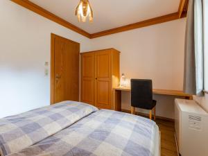 Łóżko lub łóżka w pokoju w obiekcie Chalet Tetteroo