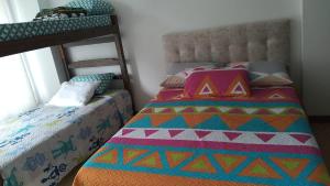 Postel nebo postele na pokoji v ubytování Apartamento Moniquira