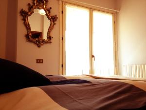 Кровать или кровати в номере B&B Il Cortile