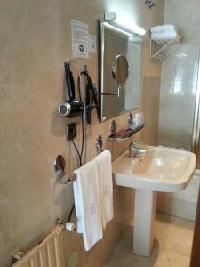 Ett badrum på Hotel Don Pepe