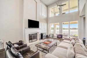a living room with a couch and a fireplace at Oak Rock Point in Horseshoe Bay