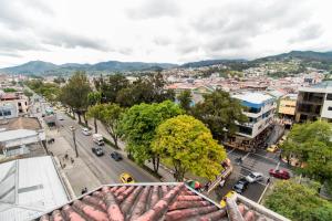 an overhead view of a city with a street at Grand Hotel Loja in Loja