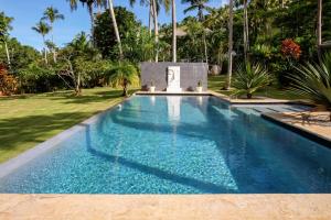Bazén v ubytování Casa Jasmin~7000 m2 of tropical garden nebo v jeho okolí
