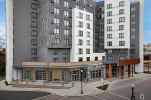 a rendering of the exterior of a hotel at Courtyard by Marriott Nanaimo in Nanaimo