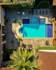 an overhead view of a swimming pool and a resort at Pousada Eclipse Paraty in Paraty
