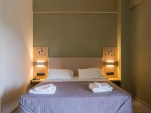 Ένα ή περισσότερα κρεβάτια σε δωμάτιο στο Paradise Resort