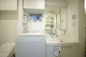 Vonios kambarys apgyvendinimo įstaigoje Real Kinshi 201