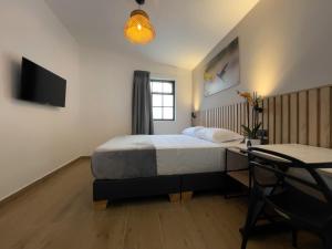 Postel nebo postele na pokoji v ubytování Vita Hotel Boutique