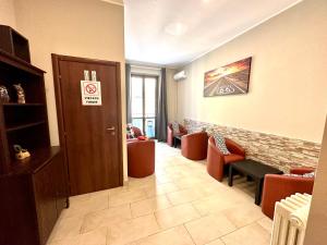 Uma área de estar em Carlo Goldoni Hotel