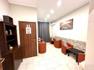Uma área de estar em Carlo Goldoni Hotel
