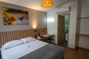 Postel nebo postele na pokoji v ubytování Vita Hotel Boutique