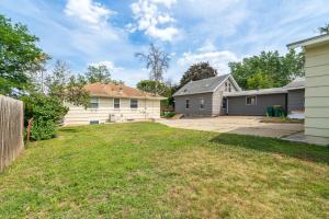 a yard with a house and a driveway at Kaleidoscope Korner in Richfield