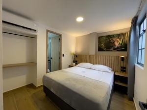 Postel nebo postele na pokoji v ubytování Vita Hotel Boutique