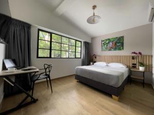 Postel nebo postele na pokoji v ubytování Vita Hotel Boutique