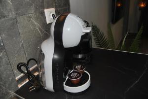 a coffee maker sitting on top of a counter at Olympus House με μοναδική θέα in Litochoro +22 photos