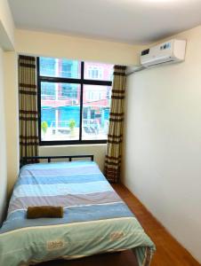 Postel nebo postele na pokoji v ubytování Hotel Ryan