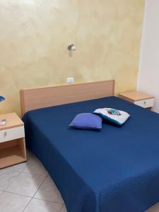 Кровать или кровати в номере Villa Angela case vacanza