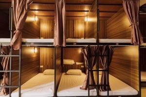 a group of bunk beds in a room at Brown Bean Hotel in Danang