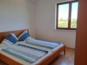 Postel nebo postele na pokoji v ubytování Apartments Pavlovic