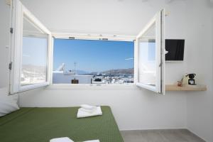 Televízia a/alebo spoločenská miestnosť v ubytovaní Salvatore's Island House
