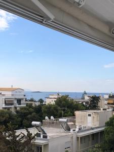 a view of a city from a building at Serafina suite byArtistUnknown in Vari