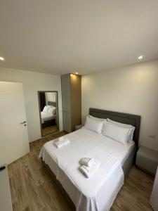 Katil atau katil-katil dalam bilik di Suite Hotel