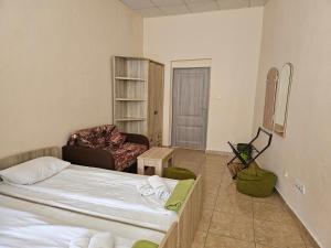 Postel nebo postele na pokoji v ubytování Coin Apartments & Poshtel