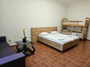 Postel nebo postele na pokoji v ubytování Coin Apartments & Poshtel