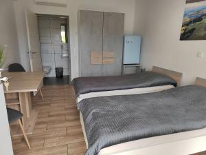 Postel nebo postele na pokoji v ubytování gästehaus bernstein