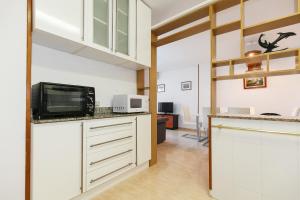 Kuchyň nebo kuchyňský kout v ubytování UHC Marathon Apartments