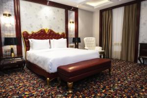 Postel nebo postele na pokoji v ubytování Move npic Zenat al Hayat Hotel