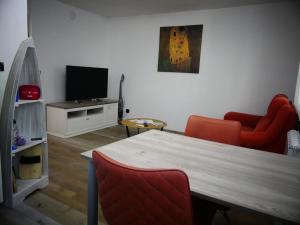 TV a/nebo společenská místnost v ubytování VISTA apartma
