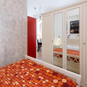 Postel nebo postele na pokoji v ubytování Rooms Boutique Carducci