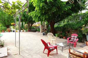 Κήπος έξω από το À l'ombre des Tilleuls