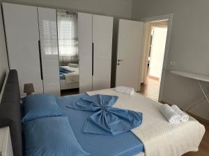 Postel nebo postele na pokoji v ubytování Hotel New York
