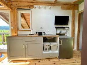 Μια τηλεόραση ή/και κέντρο ψυχαγωγίας στο Mini Loft close to Logar Valley