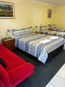Letto o letti in una camera di Emu Point Motel