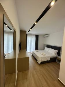 Katil atau katil-katil dalam bilik di Suite Hotel