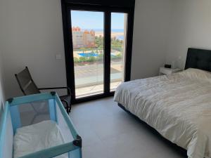 Posteľ alebo postele v izbe v ubytovaní Penthouse with wide terrace next to the ocean + 25 fotografií