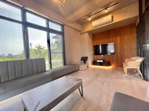 TV a/nebo společenská místnost v ubytování Jiaoxi Pusu Homestay